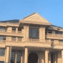 商丘黄金麻别墅外墙干挂石材效果示例