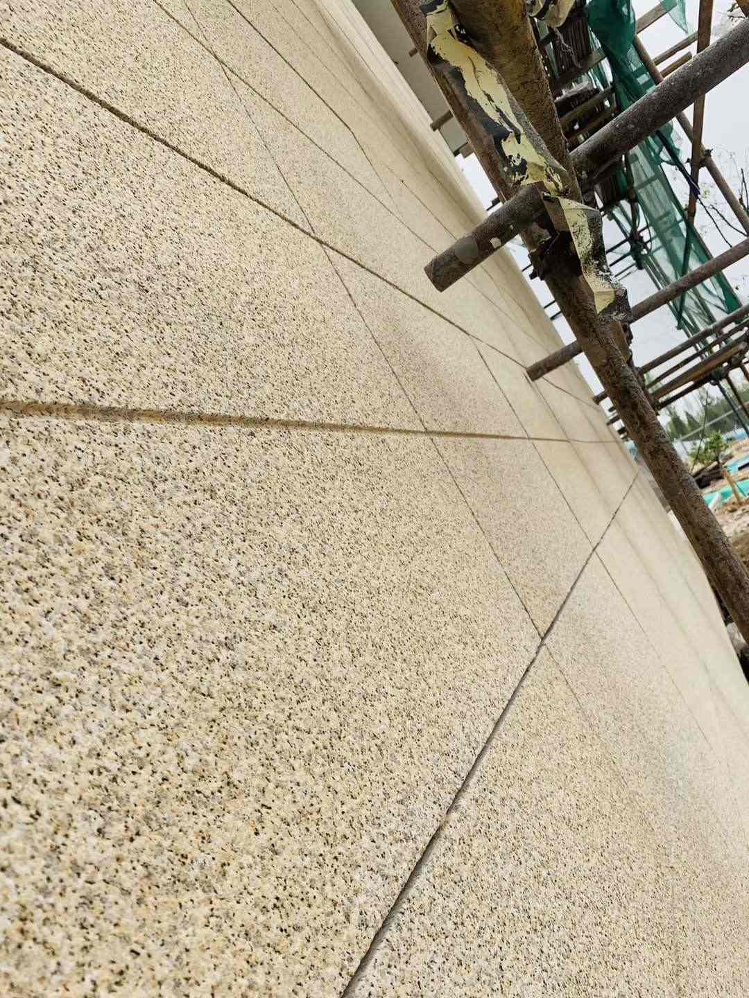 商丘 黄金麻花岗岩荔枝面外墙干挂石材效果示例